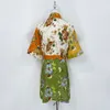 Robe de créateur australienne 2024 nouvelle couleur d'impression rétro bloquant le style de vacances lâche tempérament décontracté lin taille jusqu'à la robe chemise