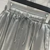 Damesbroeken Witte Fumei MOET VERGEDENDE STREADER ORGANZA Wide Leg Pants binnenkomen!Exclusieve import bloemrijke kleurrijke stof