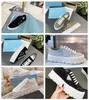 2024 Top Luxury Sporty Leather Men Sneakers Chaussures Chaussures Blanc Blanc Black Black Triangle en caoutchouc Mémoise en caoutchou