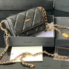21S mode New Leather Diamond Women's Clamshell Luxury Handbag Creative Chain Metal Single Chain Crossbody Armpit axelväska Makeup Bag Designer Bag Purse 12.5