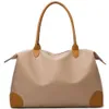 2023女性用のトップブランド旅行バッグ高品質のナイロンハンドバッグ週末旅行バッグ大容量防水荷物バッグ
