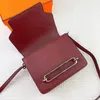 fashion luxury silver buckle decorative flip opening and closing retro Joker calf leather pig nose bags shoulder messenger bags mini ladies saddle red.