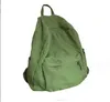 Ryggsäck amerikansk stil college college mäns kvinnors ryggsäckar solid färg canvas liten väska