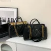 O designer de bolsa de couro vende bolsas femininas de marca com 50% de desconto para mulheres bolsa nova moda moderna e trevo crossbody com bolsa bordada