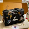 10A Twist Luxury Designer Bag Womens Высококачественная водяная оборотная кожаная сумка с плечами граффити мешок с сплава сплав с сплав