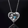 Squisito design cavo in ciondolo d'argento S925 con vibrante topazio blu marino - elegante pezzo di gioielli a forma di cuore