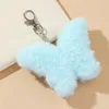 Keychains mignons en peluche pendante pendentif porte-clés de trousque féminine filles soft poupée charmes pour le sac à main de sac à main