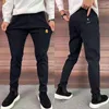 Pantaloni da uomo Pantaloni da golf di alta qualità Pantaloni sportivi elasticizzati primaverili Cintura elastica alla moda Slim per uomo Cargo Wear