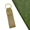 مصمم مفاتيح الأزياء G Car Key Chain Men Women Letter Key Chain Leather Gild Leather Awants Thults With Box