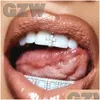 Grillz Dental Grills 18k золотые односпособные брекеты панк хип -хоп Cz Cubic циркония кросс -зубы рта клык зуб