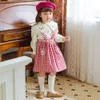 2022 Herumn Herbst New Children's Wear Girl's Gurt Red Plaid weiße Blume bestickte süße Mädchen Halbrock Korean Ausgabe