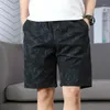 Short masculin Modèles de travail en coton Summer desserre une section mince sportive droite cinq pantalons de loisirs