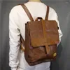 Sac à dos marque designer masculin en cuir sac vintage vintage de voyage imperméable livre décontracté mâle marron noir