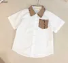 Luxe Kids Designer Designer Summer Set Baby-tracksuits Maat 100-150 cm Shirts met korte mouwen en Letter Gedrukte shorts 24mar