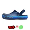 Tasarımcı Erkekler İçin Tokan Sandaletleri Kadın Delikleri Kauçuk Köpük Sandale Çapraz Talavat Terlikleri Yaz Plajı Ayakkabı Sliders Platform Slides Sliders 2024