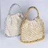 Gold silver 2 color bright paper ropes hollow woven handbag cotton lining straw bag female Reticulate handbag netted beach bag 240329