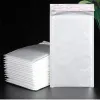 Enveloppes 100pcs / lot enveloppe de bulle sac à bulles blanches poly mailer sacs auto-phoques sacs enveloppes rembourrées pour le magazine Mailer Mailer