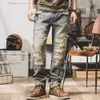 Temperamento alla moda, stile americano, jeans pesanti artigianali, gamba dritta ampia da uomo, abiti da lavoro a gamba larga traforati, pantaloni casual da mendicante