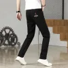 Męski projektant dżinsów Spring 23 NOWA MAŁA MAŁA MAŁA LUBA SZKOŁA SLIM FIT ELASTALNE Wszechstronne Koreańskie spodnie modowe