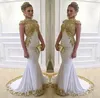 Elegente weiße Meerjungfrau Abendkleid Hochhals Gold Applikationen Crystal Prom Formal Partykleider Robe de Soiree Vestido Fiesta