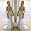 Elegente weiße Meerjungfrau Abendkleid Hochhals Gold Applikationen Crystal Prom Formal Partykleider Robe de Soiree Vestido Fiesta