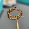 Brand Charm Gu Ailings Sago stile TFF Knot Ring V Gold Quality Rose 18K con lussuoso lusso con logo Diamond Knot con logo