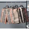 24SS Summer Mens Designers Shorts Plaid Plaid rapide Séchage des maillots de bain Streetwears Men Shorts Clothes Fashion Imprimé planche Pantalon Pantal