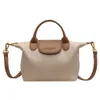 2024 Sacs de corps en cuir Pu Casual de haute qualité Sacs de luxe Designer 2023 Sac à main de style simple Nouvelle épaule classique pour les femmes