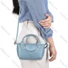 2024 Fashion Trend Crossbody Dumplings Designer Handväska kvinnor äkta läder avslappnad vintage fyrkantig axel messenger väska telefon 10a
