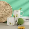 Tazze adorabili tazza di ceramica di avocado grande cartone animato con coppia di acqua rossa con cucchiaio di coperchio caffè creativo