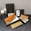 Neues Frauen Geldbeutel Muster Kuhläden leichte Luxus -Brieftasche kleine Tasche Fortgeschrittene Kurzstil einfache Mode -Multi -Karte