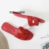 Domowe damskie Oran Paris Flat Sandals Skórzane kapcie designerskie Kobiety płaskie oran sandały skórzane buty plażowe Net Red Summer Flatse Fashiq3xk