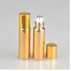 Bouteilles de rangement 5 ml UV Gold / argent / dos en verre bouteille en acier Rouleau en acier pour le parfum à la crème pour les yeux