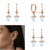 Pieno orecchini lampadici a due facce di diamante Moonstone rosa oro lungo il design del design della moda per la consegna di goccia gioielli dhioring dh0gz