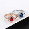 Anillos de boda de 2 piezas Anillos de boda de cristal rojo clásico para mujeres Bridal Hermoso color de oro rosa Camironia Anillo de compromiso Joya de moda R187