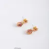 Stud-oorbellen Europese en Amerikaanse sieraden Handgeschilderde emailglazuur Kleine delicate granaatappelbloemen Zoet temperament