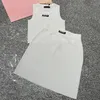 Designer vrouwen gebreide singlet rokken set witte shirt rok breisels outfits elegante casual dagelijkse mini jurk jumper tanks sets