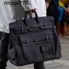 Handgefertigte BK -Bag -Handtaschen 50 cm große HAC -Familiendesignertaschen 2024 Litchi Muster zusätzliche Tasche 50 cm Unisex Business Trip Gepäck Kapazität Handheld