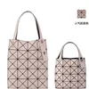 Femmes 2024 Sacs de créateurs d'origine japonais en vente sac à main neuf Four Grid Mini Cross Body For Women Square Parent-Child Child Frosted Carring Sac portable