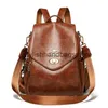 Рюкзак в стиле женщины Новая сумка для плеча с большой способностью и крышкой для практической удобной простых модных исходящих универсальных модных H240403