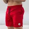 Jeans masculin Summer Fitness Shorts sports décontractés à la course de basket-ball Pantalon à séchage rapide