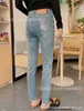 Designer South Oil Women's High Waist and Piccolo Jeans Versione coreana Slimt fit and Slimming a 9 punti pantaloni a matita elastici a 9 punti AM3J