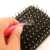 2024 Novo mini escova de cabelo pentes de limpador ferramenta embutida Ferramenta de limpeza de plástico Handeline