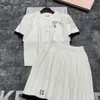 MIMU Early Spring New Girl Style Diamond Grid Short Sleeved Knitted Top+pleated Half Skirt Knitted Set