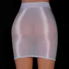 Abiti sexy urbani lucidi Micro Mini Mini Skirt Club Sexy Weer Vedi attraverso gonne Donne sexy Skirt Hip Scava trasparente forma a cavità stretta attiva 2443