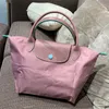 Designer tote bag Designer Women Occiglia Borse per laptop Scuola per la spiaggia Travel Nylon Borsa Borsa Borsa a tracota borse nere