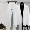 2pcs Männer Blazer Hosen Set Spring Fashion Anzug Streifen Falten Langarm Turnenkragen Jacke Kordelstringhose für Hochzeit 240326