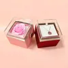 Enveloppe cadeau 1pc Boîte de fleurs de rose éternelle rotative Boîne à anneaux Collier Boîtes de rangement Boîtes de rangement