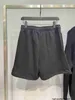 Designer INS 22SS Summer Paris Lekstagade herr- och kvinnors casual lösa shorts RP2T