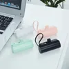 Power Power Banks сотовой связи 2024 Новая версия Pocket Capsule Power Bank 10000 MAH держатель мобильного телефона мини -портативный мощный банк может быть доставлен на самолете 2443